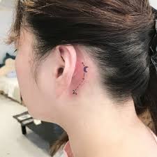 Bird Tattoo Behind Ear Meaning Zodiac Taurus And Crescent Moon Behind The Ear Tattoo Taurus Tattoos Behind Ear Tattoos Taurus Constellation Tattoo