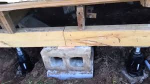 Leveling A Pier Beam After Replacing The Rotten Floor Joists And Beams Dallas Fort Worth Foundation Repair Foundation Repair House Foundation Home Repair