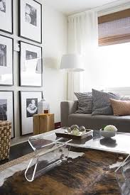 Love This Tall Wall Of Custom Framed Photos Featuring Bottom Weighted Mats Home Living Room Contemporary Living Room Interior