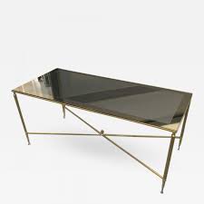 Whether you want a round coffee table or a square one, a glass coffee table or one of marble, you'll find it here. Rectangular Brass Coffee Table With Smoked Glass