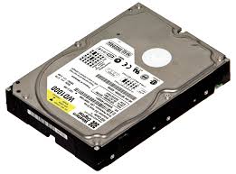 A Hard Disk Is A Storage Device That Contains One Or More Inflexible Circular Platters That Use Magnetic Particl Electronic Scrap Hard Disk Computer Recycling