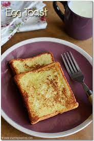 Dip both sides of your bread into the egg mixture and add to the pan. French Toast Recipe Easy Bread Toast With Eggs Sharmis Passions
