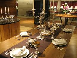 Often, in less formal settings, the napkin should be in the wine glass. Royal Selangor Pewter Gorgeous Table Setting Photo