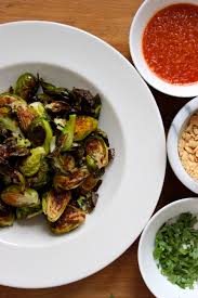 Brussels sprouts, trim ends only and leave whole olive oil salt and pepper. Roasted Brussel Sprouts With Sweet Lime Sriracha Sauce Big Sis Little Dish
