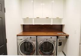 a walnut counter and backsplash in the