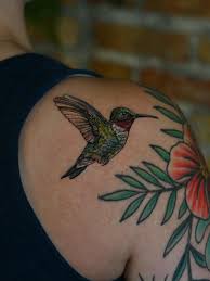 This ruby-throated hummingbird took around 2.5 hours to complete. Layering  in the smallest details builds toward a realistic effect. (Surrounding work  not mine)