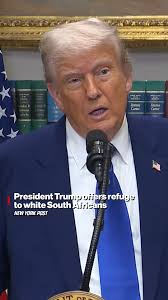 President Trump accused South Africa of engaging in “genocide” against its  white minority as the first planeload of Afrikaners granted refugee status  touched down in the US.