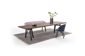 A table that consists of a board…. Trestle Table Arco