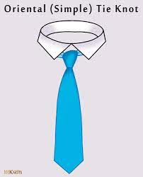 Learn how to tie a tie step by step: Tying A Simple Small Oriental Tie Knot Step By Step Tutorial