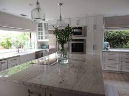 As with all black granite, it pairs naturally with white cabinets for a traditional feel. River White Granite Countertops Transitional Kitchen Sherwin Williams Dorian Gray K Sarah Designs