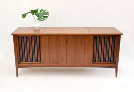 In some cases the cabinet originally cost much more than the radio that was installed inside of it and today these cabinets are valued by antique furniture collectors regardless of what is inside of them. Fabulous Mid Century Stereo Cabinet Console Credenza Sold Vintage Modern Maine