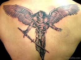 Christian icons like guardian angels inspire the essence of salvation by everlastingly engraving a link with mysticism. Guardian Angel Warrior Back Tattoo Novocom Top