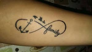 Anchor and infinity tattoo on upperback. 77 Infinity Sign With Birds Tattoo