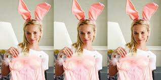 Whoever said orange was the new pink was seriously disturbed! Reese Witherspoon Tries On Legally Blonde Costumes 15 Years Later Legally Blonde 15 Year Anniversary