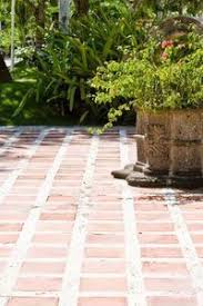 Putting deck tiles on concrete. How To Tile Over A Brick Hearth Concrete Patio Outdoor Patio Tiles