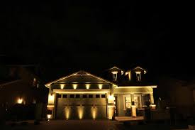 How Architectural Landscape Lighting Can Highlight Your Custom Garage Door A1 Garage Door Service