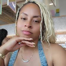 Dormonique Scruggs updated her...