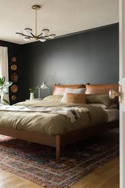 Our mid century modern bedroom has definitely been tweaked here and there over the past year and a half. Tricorn Black Master Bedroom Reveal Black Master Bedroom Master Bedroom Layout Black Walls Bedroom