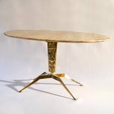 If the item details above aren't accurate or complete, we want to know about it. Coffee Table With Oval Marble Top On Bronze Base Attributed To Duilio Barnabe For Sale At Pamono