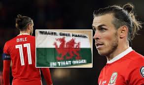 In that order written across it. Gareth Bale Laughs Off Criticism As Wales Fans Mock Real Madrid Football Sport Express Co Uk