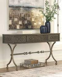 Champagne color finished metal complements the antiqued gray finished wood. Quinnland Antique Black Console Sofa Table On Sale At American Furniture Of Slidell Serving Slidell La