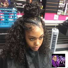 Half up half down hairstyles are very versatile and beautiful perfect for any occasion, from an everyday casual look to a more formal and elegant event you can create a beautiful half up half down hairstyles without any problem and look amazing with it. Half Braided Down Black Hairstyles Images Hair Surion Org Braids For Black Hair Hair Styles Half Up Hair