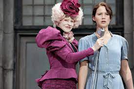 In the book-to-movie adaptation, The Hunger Games (2012), when Effie  Trinket, President Snow, and Caesar repeat the phrase, may the odds be  ever in your favor, theyre foreshadowing how the odds would