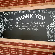 Giraffe storage basket is hand woven of wicker and albaca rope over round bar frame. Market Basket Grocery Store