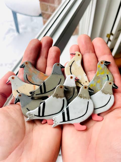 Hand-painted ceramic clay pigeons by artist