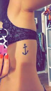 Subtle botanical tattoo on the right rib. Pin On Tattoos