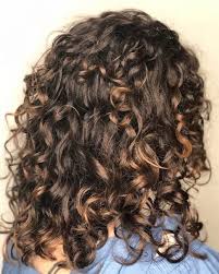 Skillful layering from a stylist who is experienced with with curly hair will cut out bulk, create a … 30 Best Curly Hairstyles For Medium Hair Belletag