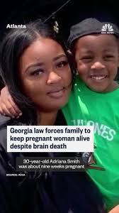 A pregnant Atlanta woman was declared brain dead, but due Georgia’s  controversial heartbeat law, doctors are keeping her alive long enough to  deliver her baby.