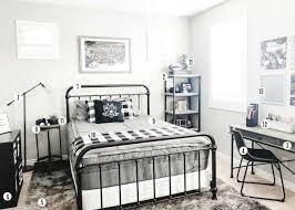 She created this amazing orange, black and gray bedroom that's perfect for a teenage boy! Boys Bedroom Decor From Somewhat Simple