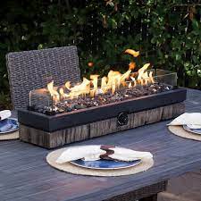 A gas fire pit table, in the simplest terms, is a portable propane gas tank connected to a burner in a concave bowl or basket in the middle of a very stylish table meant to provide warmth in your patio or backyard. Outdoor Fire Pit Propane Gas Heater Table Top Fireplace Patio Durable Portable Yard Garden Outdoor Living Fire Pits Chimineas