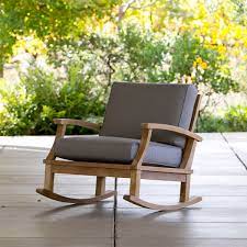 Boardwalk dark brown acacia wood outdoor rocking chair rest easy on your porch, deck, or in your rest easy on your porch, deck, or in your backyard with this classically designed patio rocking chair. Ravello Rocking Lounge Chair Teak Furniture Terra Outdoor Living