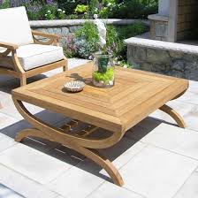 Find the perfect oval, square & round coffee tables for your patio, garden or simply outside or in. Perfect For Centering Any Lounge Area The Fiori Square Coffee Table Creates A Classic Styli Teak Outdoor Coffee Table Teak Coffee Table Outdoor Coffee Tables
