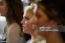 Debutante Millie Lockwood, from london, poses as she awaits the... News  Photo