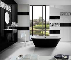 This bathroom boasts a beautiful black tile on a single wall, which can feel dark in an enclosed space. Black And White Tile Is A Huge Bath Trend