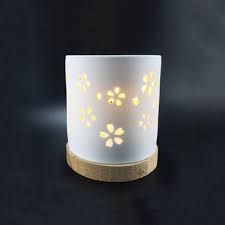 Cylinder Flower Hollowed White Ceramic Candle Holder With Wooden Base Buy Ceramic Christmas Candle Holders Ceramic Rose Candle Holder Wooden Base Candle Holder Product On Alibaba Com