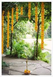 Hanging Flowers Photographed By Bonnie Tsang Via 100 Layer Cake Indian Wedding Decorations Marigold Wedding Wedding