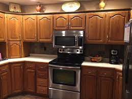 Rl to help me spiffy up our kitchen a bit! Golden Oak Cabinets Are Unfortunately Staying But What Granite Color
