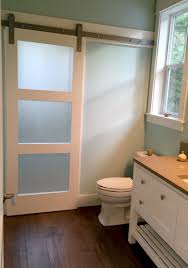 Barn doors are super trendy, but often one of the places that people want to use them is on a bathroom. Frosted Glass Barn Door Adds Privacy To Shower Room On Other Side In Evenings When Shower Room Ligh Frosted Glass Barn Door Inside Barn Doors Glass Barn Doors