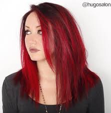 Taking the front piece of hair and curling it. 50 Amazing Haircuts For Round Faces Hair Adviser