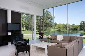 If you're lucky enough to live across the sea or surrounded by nature, you just hit the jackpot! 20 Living Rooms With Floor To Ceiling Windows Home Design Lover