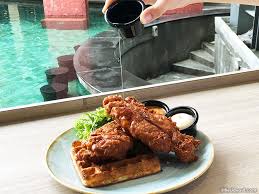 The recipe for har cheong gai differs from other fried chicken recipes in that the marinade and the batter are not separate; Grub Balestier Har Cheong Gai Waffles Massive Fish Burger Little Day Out