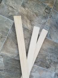 Wood tripod floor lamp {west elm} ~ this west elm hack shows you how to create a trendy tripod lamp from 3/4 inch square wood, a lamp kit, clamps and spray paint. Easy Diy Tripod Lamp Hometalk
