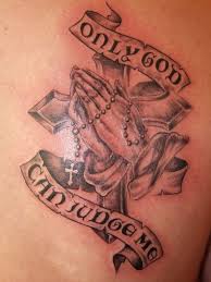 The key focus is on the cross and the praying hands at the bottom. 37 Cool Praying Hands Tattoo Designs With Meanings Body Art Guru