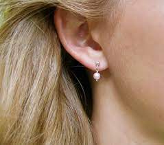 4.4 out of 5 stars 2,125. Little Girl Pink Swarovski Pearl Sterling Silver Earrings Etsy