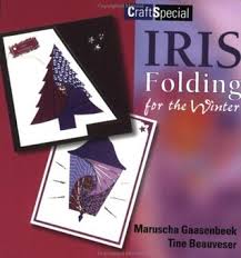Next, bring all 4 corners together so they meet at the bottom and then rotate the diamond so the open flaps are at the top. Iris Folding For The Winter By Maruscha Gaasenbeek