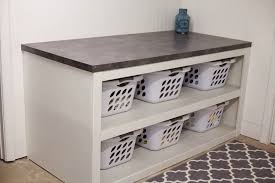 It's easy to get overwhelmed with do it yourself projects, but this laundry folding table is a really simple plan and is completely customizable. Diy Laundry Folding Station Novocom Top